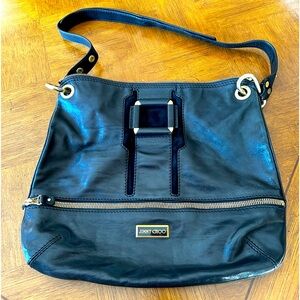Beautiful Jimmy Choo Crossbody Bag

Black leather with gold-tone hardware.